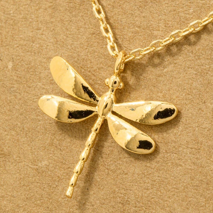 Gold dipped dragonfly pendant necklace on a delicate chain