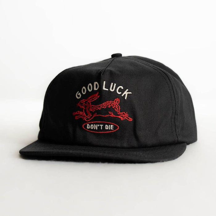 Black cap with red embroidered graphic and white text reading GOOD LUCK DON'T DIE