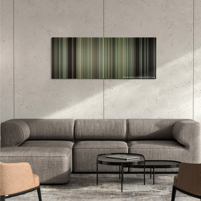 Gran Torino color palette canvas on a concrete wall above a gray sectional sofa