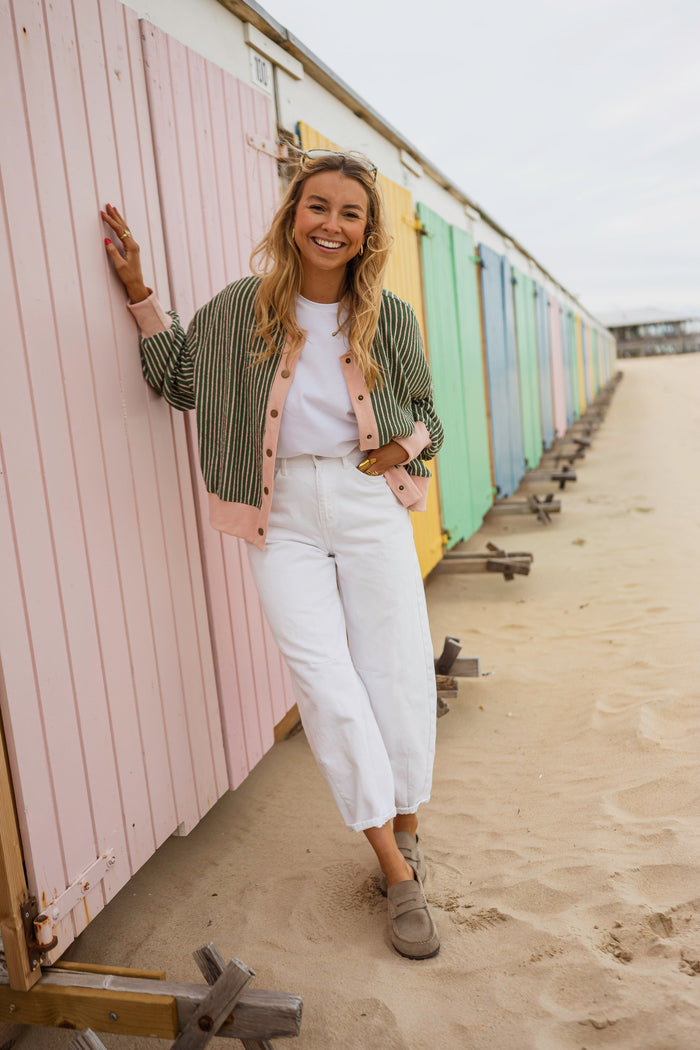 Verda cardigan showing green and pink stripes