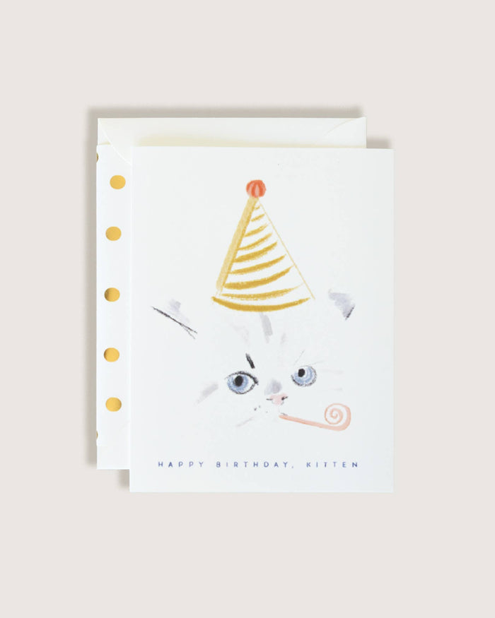 Greeting card with a cat wearing a party hat on a beige background