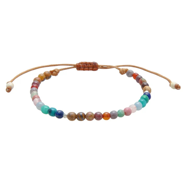 Healing Crystal Bracelet with a row of multicolored beads on a tan adjustable cord