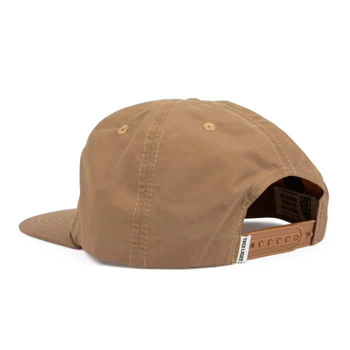 Back view of tan Howdy flatbrim hat with an adjustable plastic strap