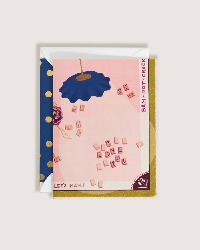 Greeting card with blue umbrella design on a pink background