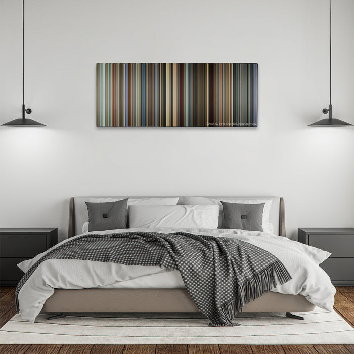 I, Tonya color palette canvas above a bed, between two black pendant lamps