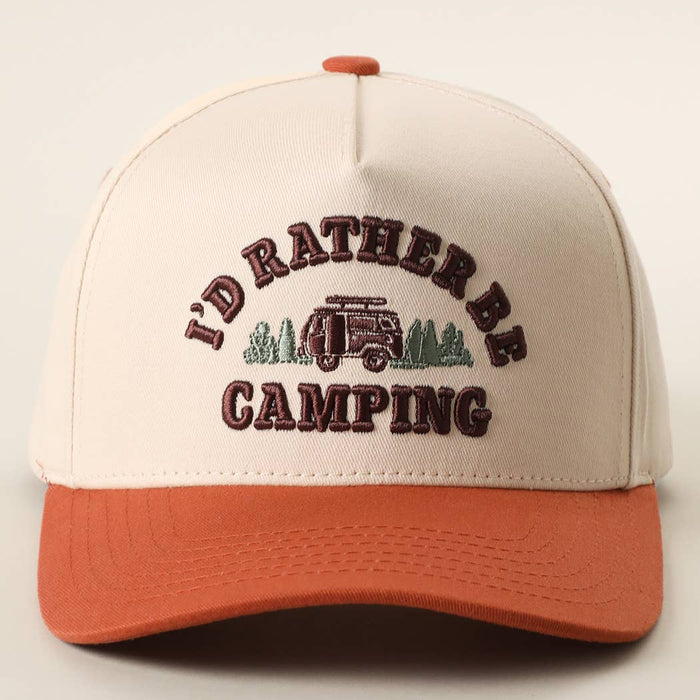 Beige trucker hat with an orange brim and maroon camping embroidery reading I'D RATHER BE CAMPING.