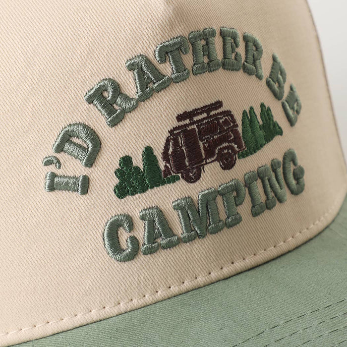 Close up of beige trucker cap with mint green embroidery reading I'd Rather Be Camping and a jeep icon