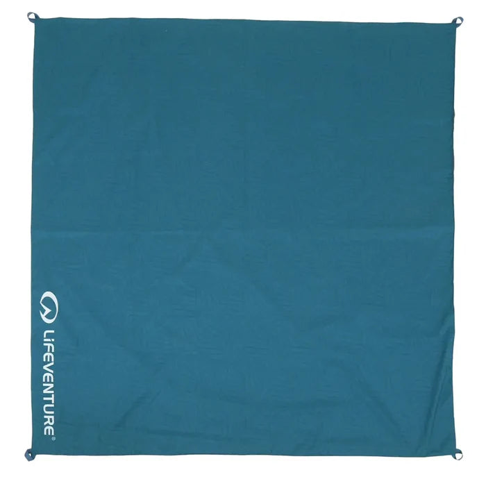Overhead shot of a Lifeventure picnic blanket in the hex pattern opened out showing the four corner peg loops
