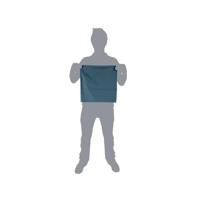 Pictorial image showing the relative size of a Lifeventure SoftFibre recycled travel towel in pocket size  in comparison to a person