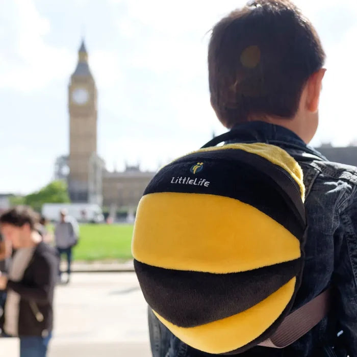Child wearing a Littlelife Bee Toddler Backpack whilst walking around Londons sights