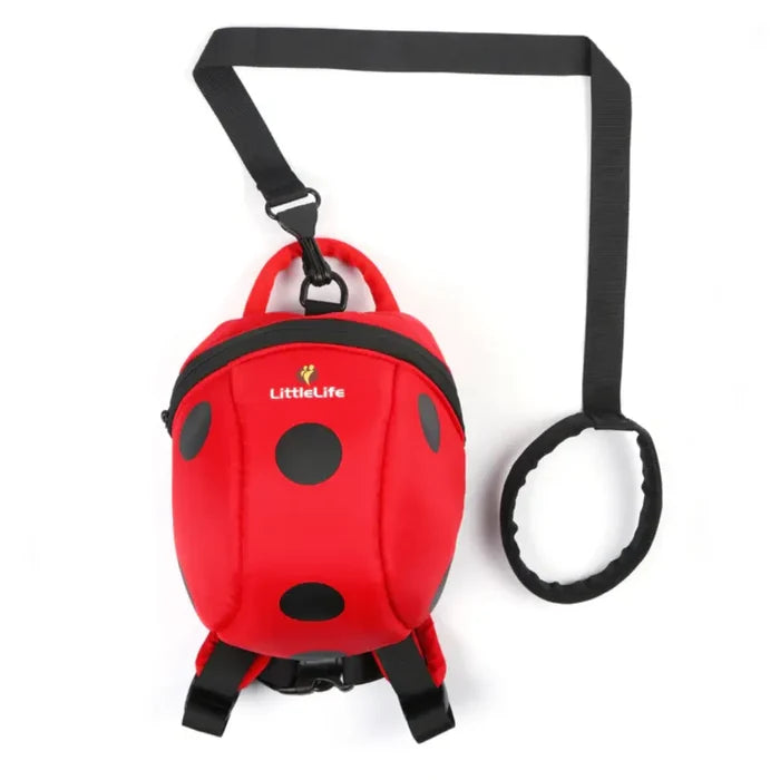 Littlelife Ladybird Toddler Backpack shown with the safety rein attached on a white background