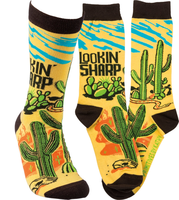 Lookin' Sharp unisex socks in a desert cactus print on bright yellow with brown cuffs