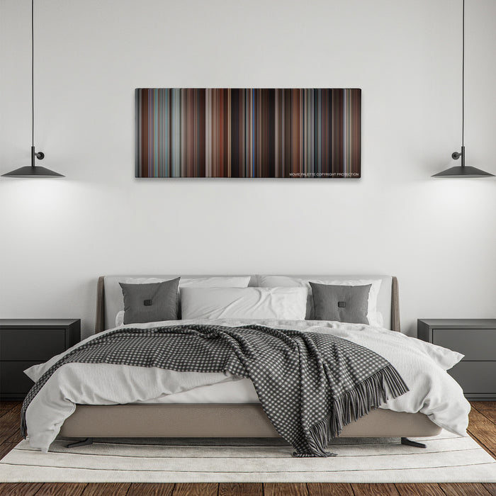 Love & Other Drugs color palette canvas above a bed, between two black pendant lamps