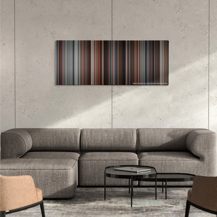 Love & Other Drugs color palette canvas on a concrete wall above a gray sectional sofa