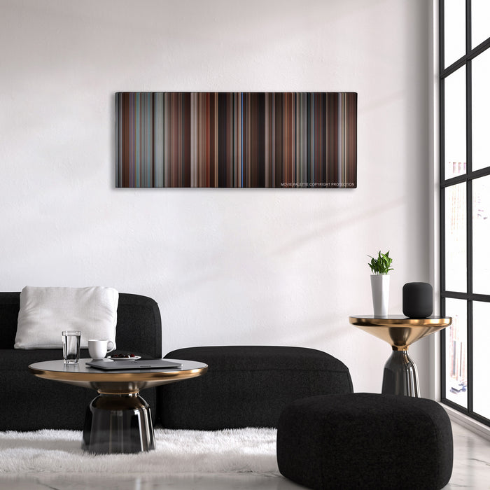 Love & Other Drugs color palette canvas above a black sofa with a gold-topped table