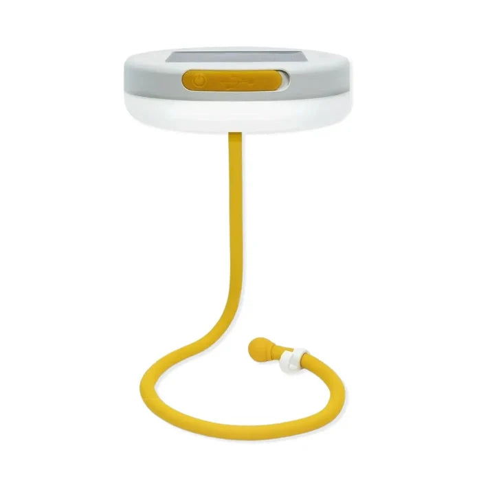Luci portable solar powered light propped up using the flexible stand arm