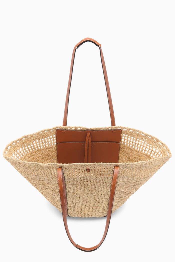 Natural Luxury Raffia Tote Interior with Leather Pocket and Tan Handles - Top View | Ulla Johnson