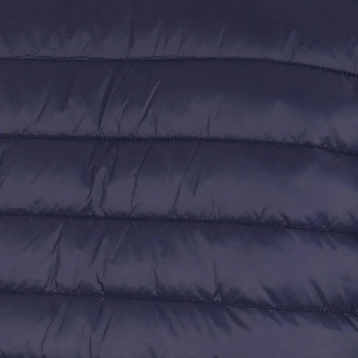 Close-up detail of a Sub Zero mens lightweight synthetic insulated jacket in navy blue showing the micro stitching employed in the baffle construction