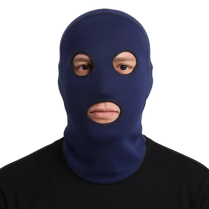 Man wearing a Sub Zero Meraklon three hole thermal balaclava in navy on a white background