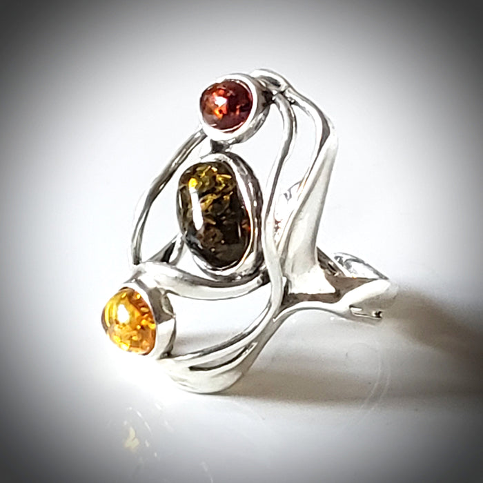 Modern silver ring with 3 different color amber stone