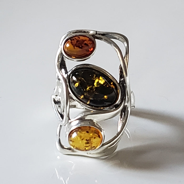 Modern silver ring with 3 different color amber stone
