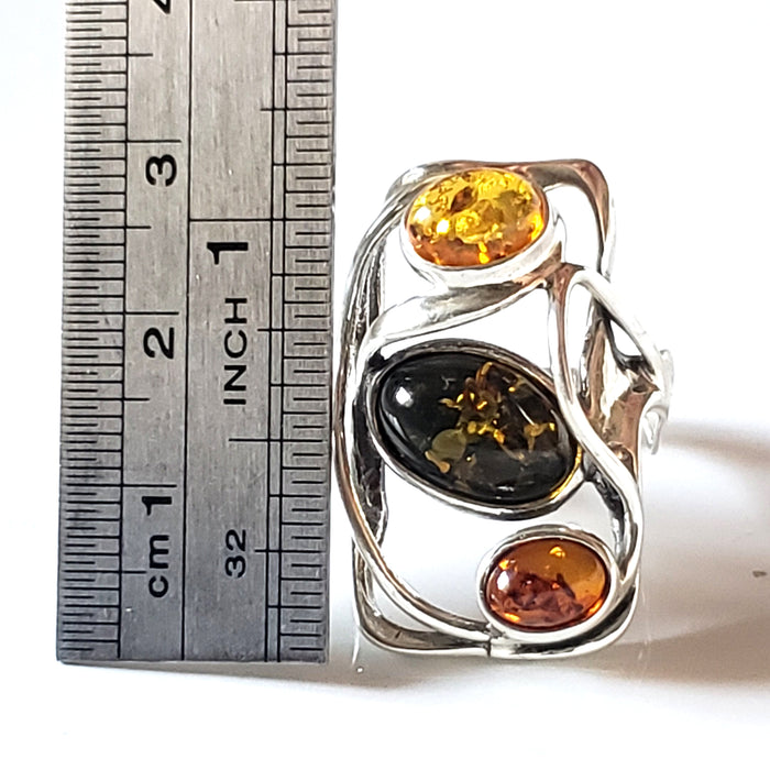 size of amver in Modern silver ring with 3 different color amber stone