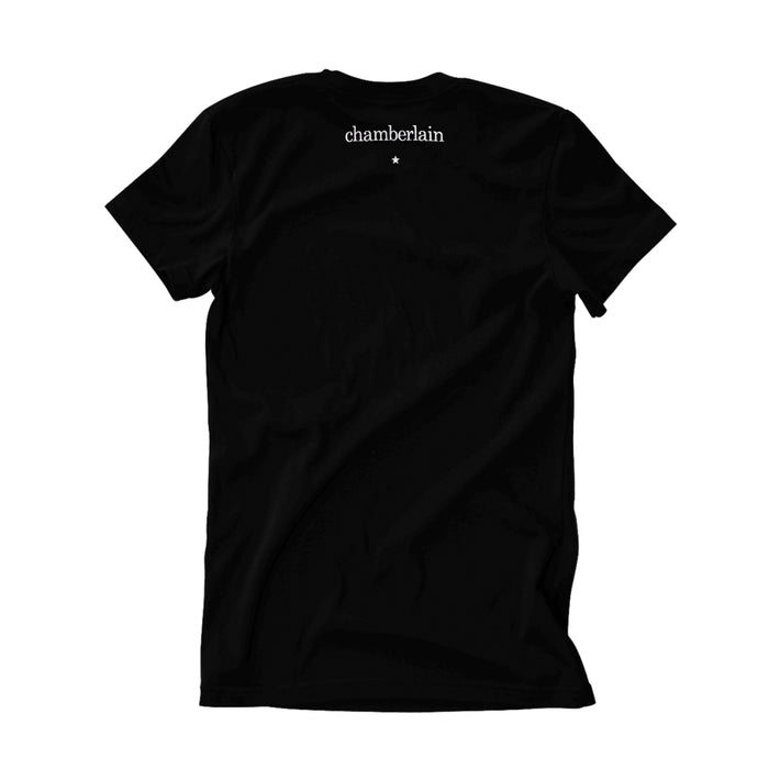 A plain black Chamberlain T-shirt shown from the back, featuring chamberlain and a small white star printed near the neckline.