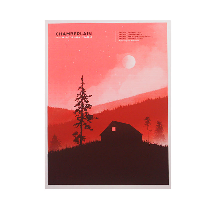 A striking 18 x 24 poster from Chamberlain features a red gradient background with a cabin and trees silhouetted on a hillside under a large moon. “CHAMBERLAIN: 20 Years of The Moon My Saddle” headlines the concert details in white.