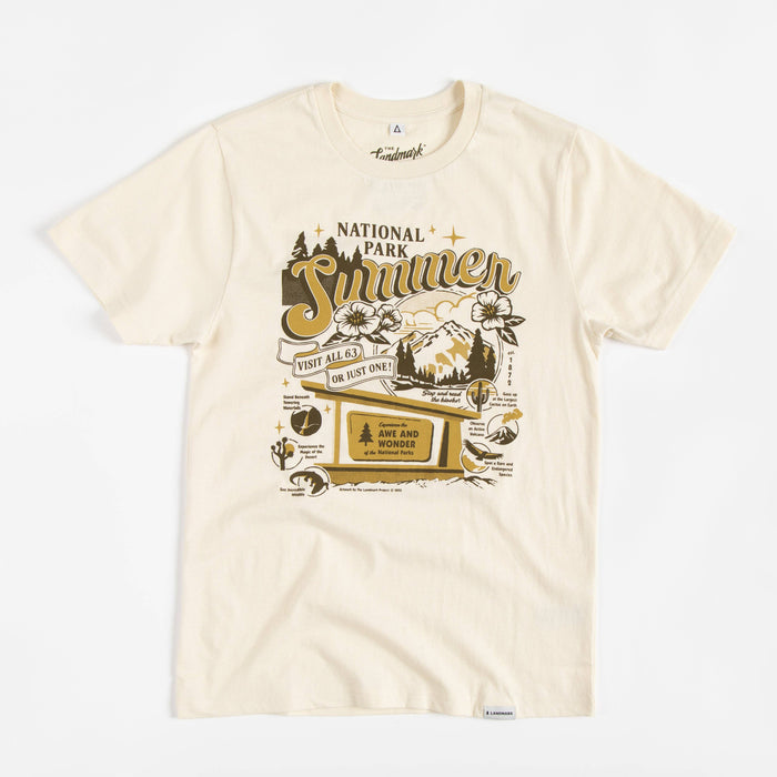 Cream colored t shirt with a large vintage National Park Summer graphic showing mountains and flowers
