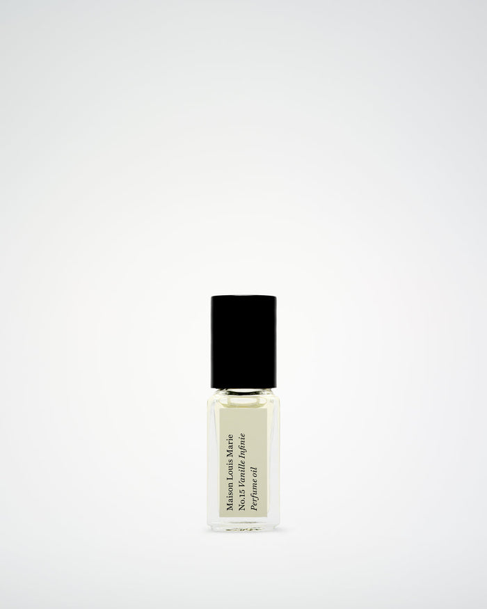 Perfume bottle with black cap on a white background