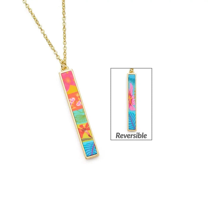 Vertical paradise island reversible bar necklace with bright tropical print on a gold chain.