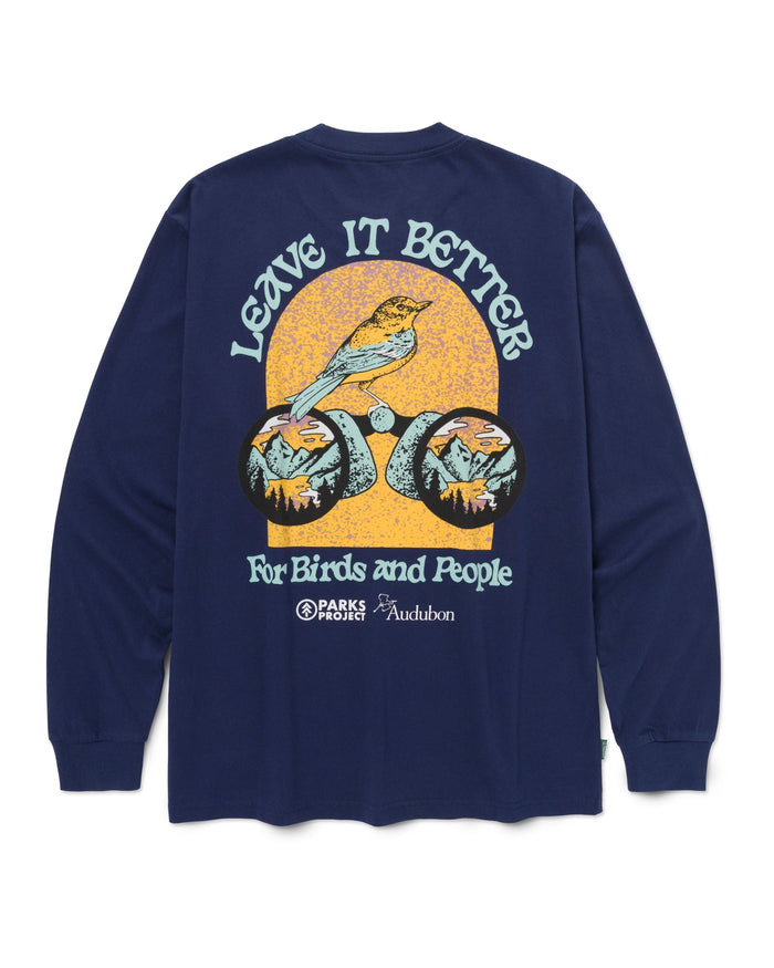 Back of navy long sleeve tee with large colorful bird graphic against a sun and mountains and Parks Project Audubon logos.