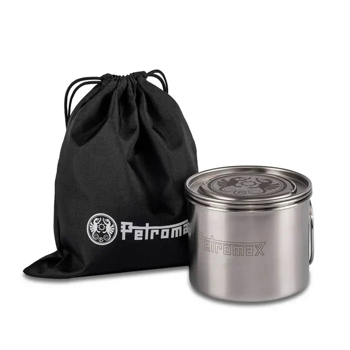 Petromax stove cup nested together for ease of carrying with its transport bag in the background