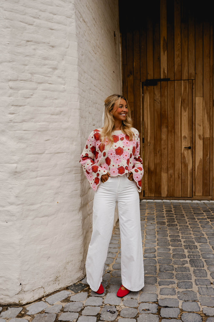 Pink and red crochet blouse flared cuff detail