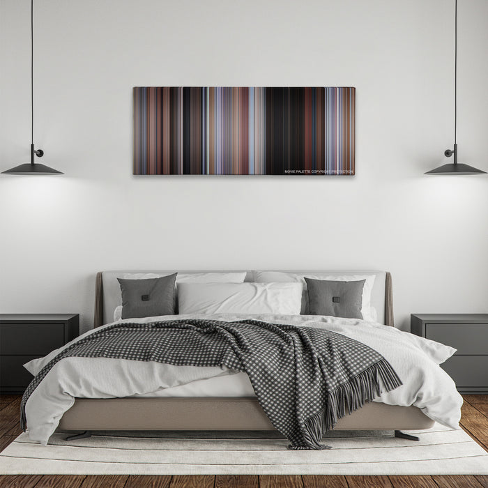 Planes, Trains & Automobiles color palette canvas above a bed, between two black pendant lamps