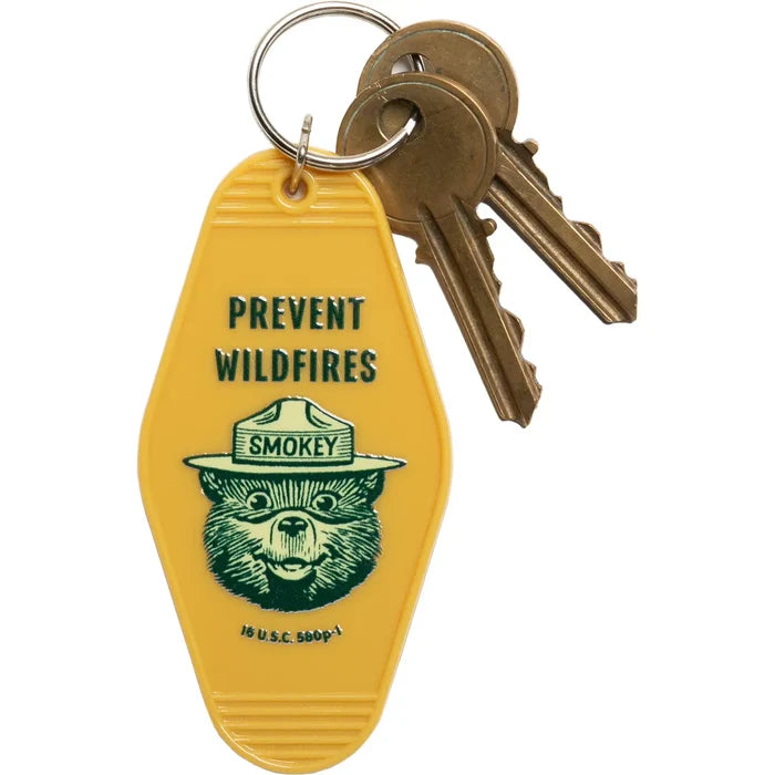 Yellow prevent wildfires keychain featuring Smokey the Bear and the words Prevent Wildfires.