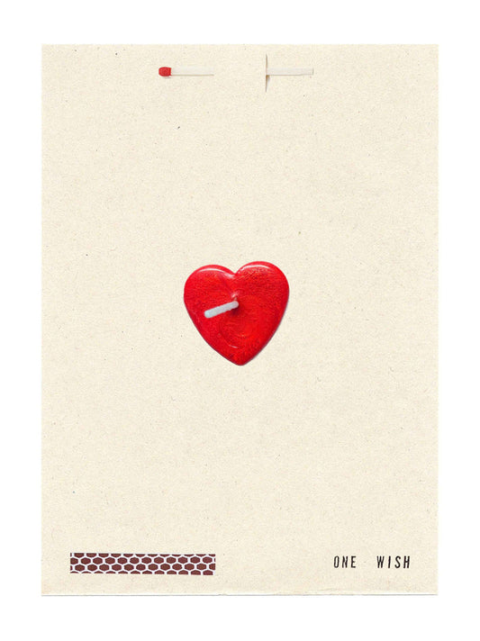 Card with a red heart-shaped candle on a beige background with 'ONE WISH' text. Candle wax and wick in the center of the card.