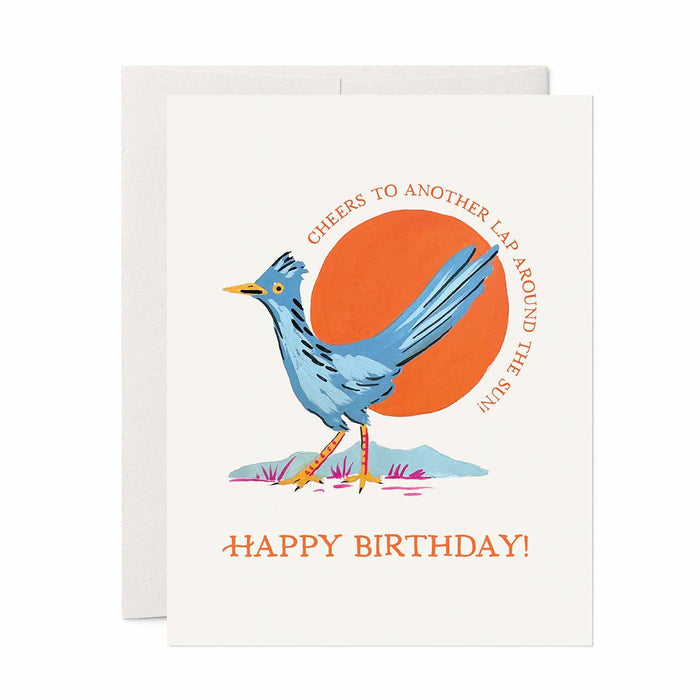 Roadrunner Birthday Card featuring a blue roadrunner in front of an orange sun and curved birthday message.