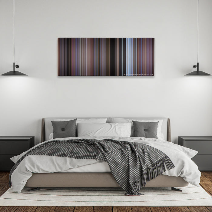 Rocky III color palette canvas above a bed, between two black pendant lamps