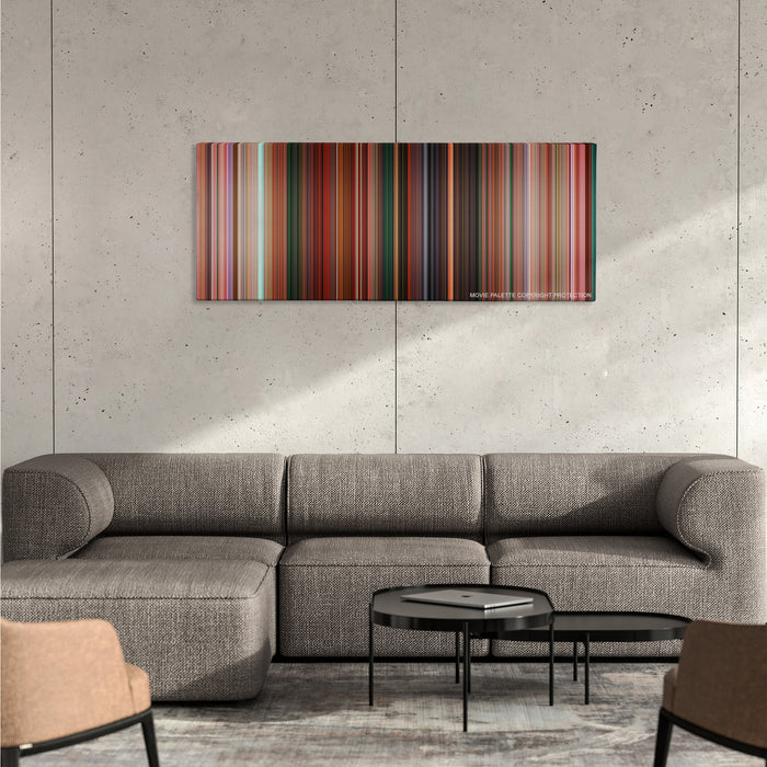 Sausage Party color palette canvas on a concrete wall above a gray sectional sofa