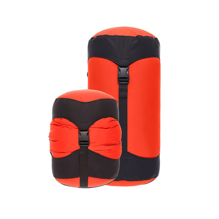 Sea To Summit lightweight compression sacks in Spicy Orange colour showing the difference in size between compressed and non-compressed