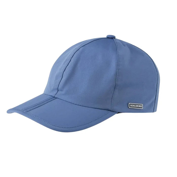 Side View of Sealskinz Salle waterproof lightweight foldable peak Cap in blue colour