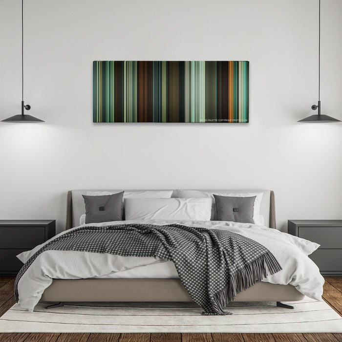 Shame color palette canvas above a bed, between two black pendant lamps