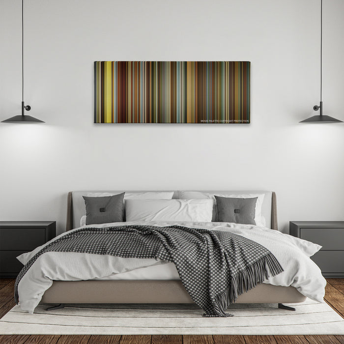 Side Effects color palette canvas above a bed, between two black pendant lamps