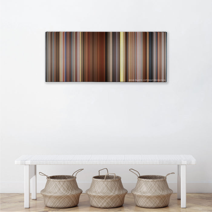 Sideways color palette canvas above a white bench with three woven baskets