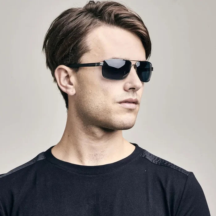 Lifestyle shot of a man wearing Sinner Durness wire framed polarised sunglasses