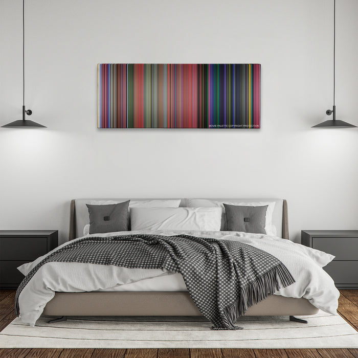 Sleeping Beauty color palette canvas above a bed, between two black pendant lamps