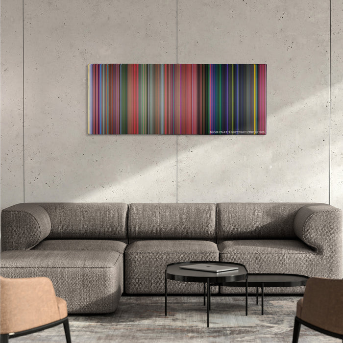Sleeping Beauty color palette canvas on a concrete wall above a gray sectional sofa