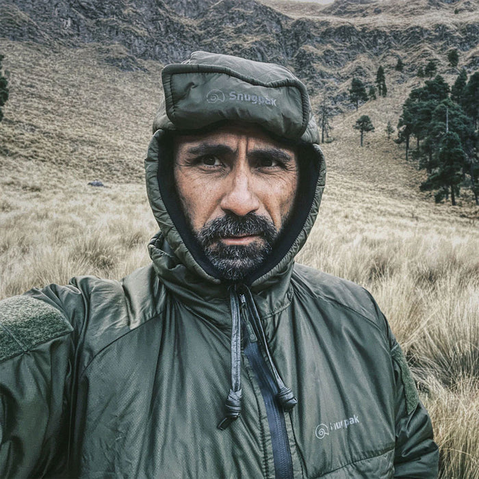 Snugpak Snugnut insulated winter hat being worn in the wild by a man
