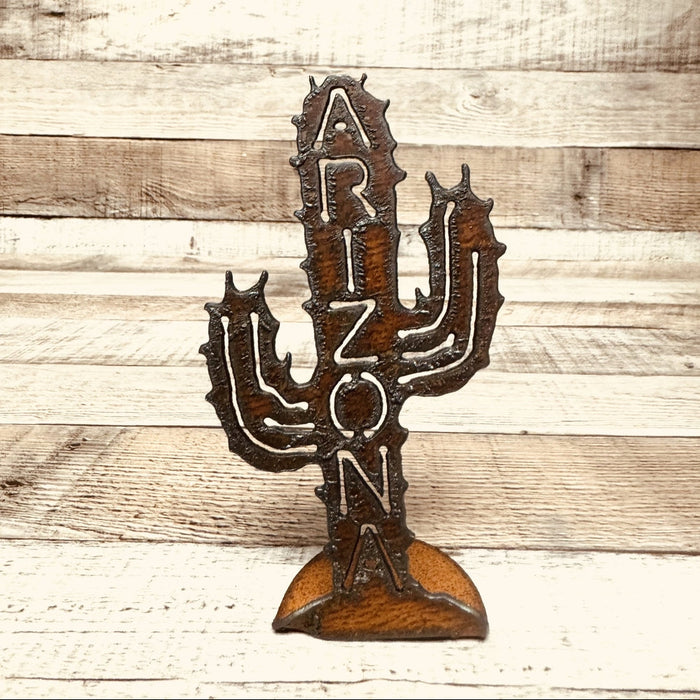 Arizona metal cutout standee featuring a tall spiky saguaro cactus on a curved base